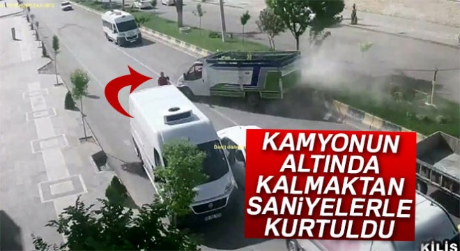 Kamyonun altında kalmaktan saniyelerle kurtuldu