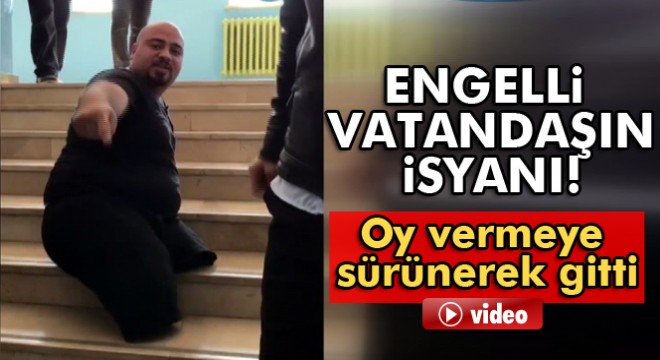 Sandığa giden engelli merdivenlerden sürünerek çıktı